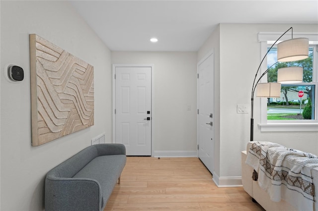 1707 Solon Ave, Dunedin, FL 34698 - entrance foyer featuring wood finished floors and recessed lighting