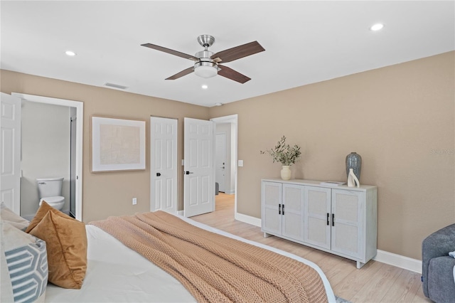 1707 Solon Ave, Dunedin, FL 34698 - bedroom featuring light wood finished floors, ensuite bathroom, recessed lighting, and ceiling fan