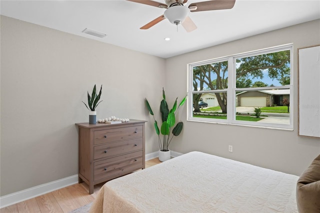 1707 Solon Ave, Dunedin, FL 34698 - bedroom with wood finished floors, a ceiling fan, and recessed lighting