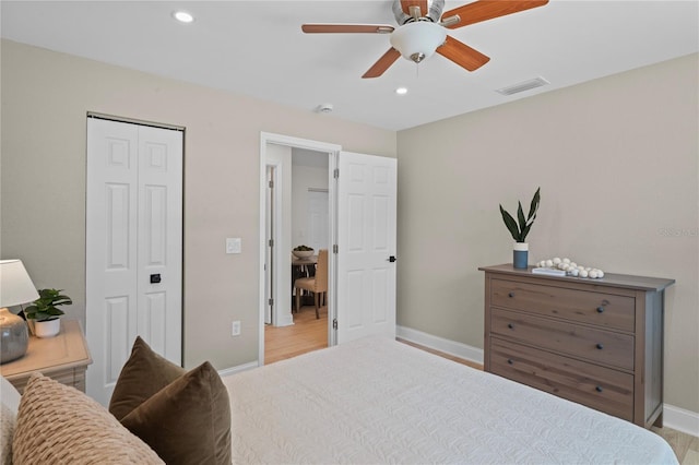 1707 Solon Ave, Dunedin, FL 34698 - bedroom with recessed lighting, a closet, wood finished floors, and a ceiling fan