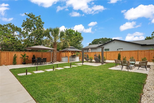 1707 Solon Ave, Dunedin, FL 34698 - fenced backyard featuring a gazebo and a patio