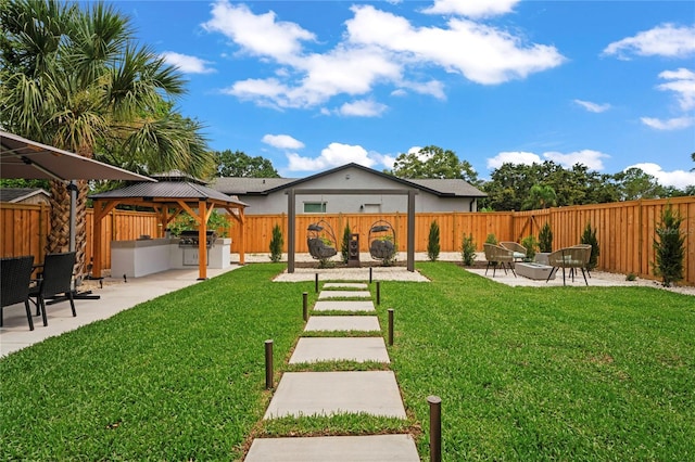 1707 Solon Ave, Dunedin, FL 34698 - fenced backyard featuring a gazebo and a patio area