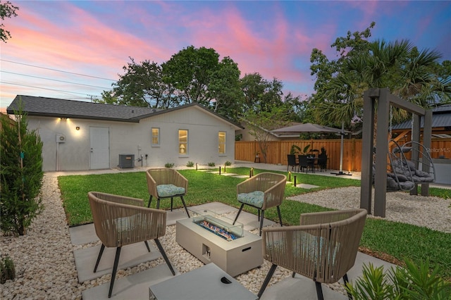 1707 Solon Ave, Dunedin, FL 34698 - view of patio featuring a fire pit