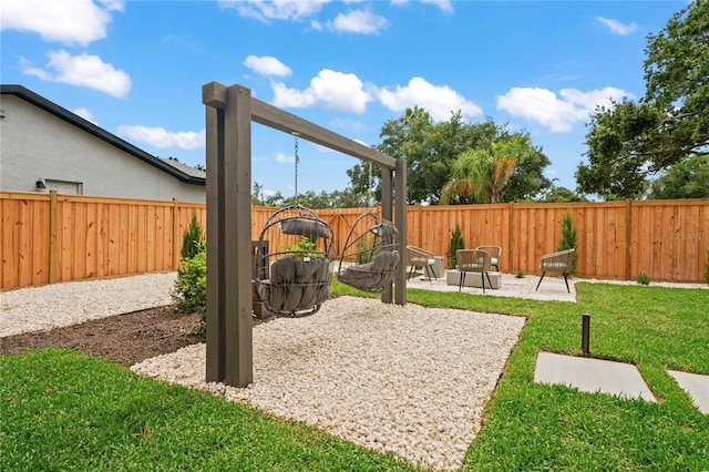 1707 Solon Ave, Dunedin, FL 34698 - fenced backyard featuring a patio area