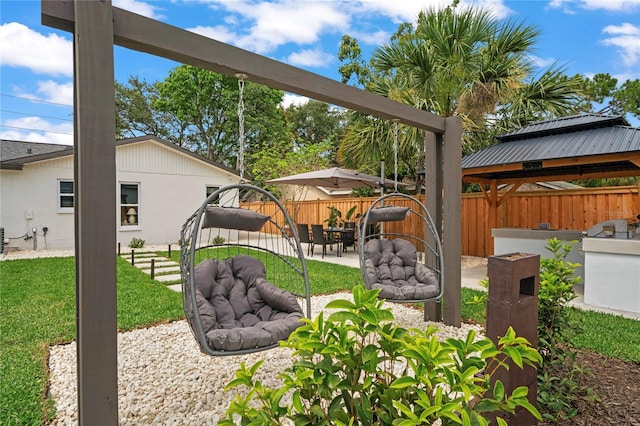 1707 Solon Ave, Dunedin, FL 34698 - fenced backyard featuring a patio area and a gazebo