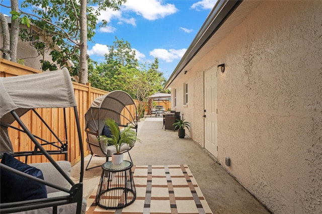 1707 Solon Ave, Dunedin, FL 34698 - fenced backyard with a patio area and a storage shed