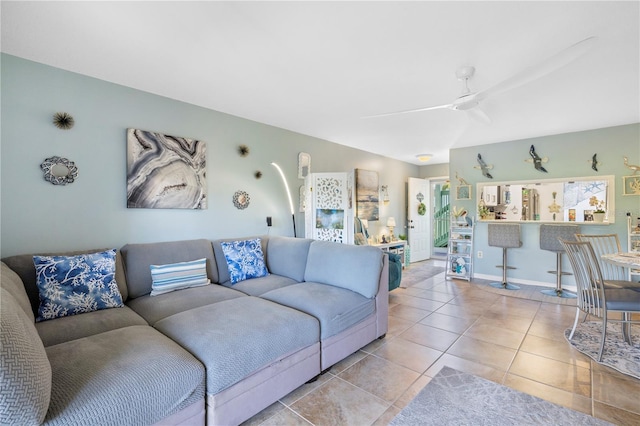 5725 Pelican Pointe Dr Unit 1, Sebastian, FL 32958 - tiled living area featuring a ceiling fan and baseboards