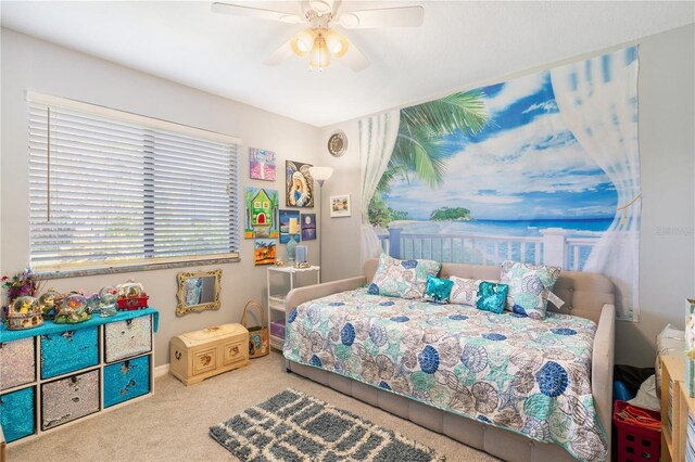 5725 Pelican Pointe Dr Unit 1, Sebastian, FL 32958 - carpeted bedroom featuring ceiling fan and baseboards