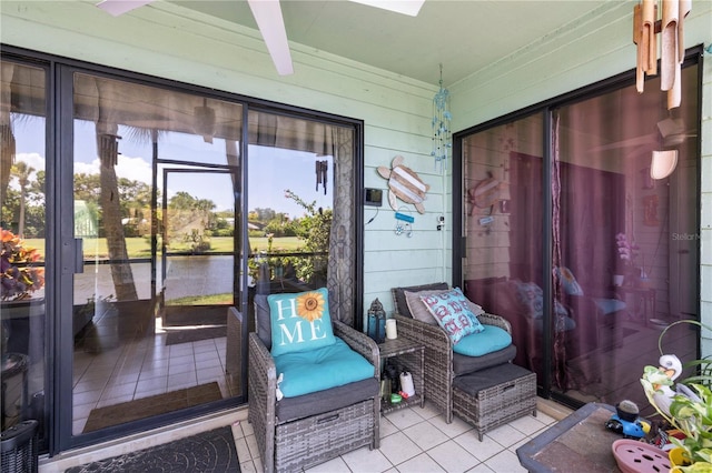 5725 Pelican Pointe Dr Unit 1, Sebastian, FL 32958 - sunroom with a water view