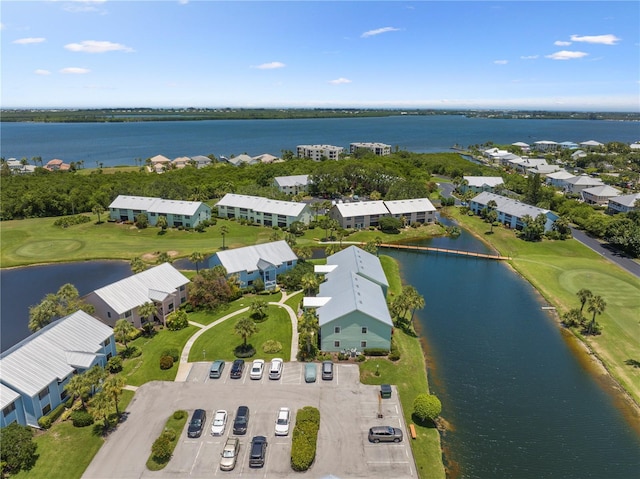 5725 Pelican Pointe Dr Unit 1, Sebastian, FL 32958 - drone / aerial view of a nearby body of water and a local golf course
