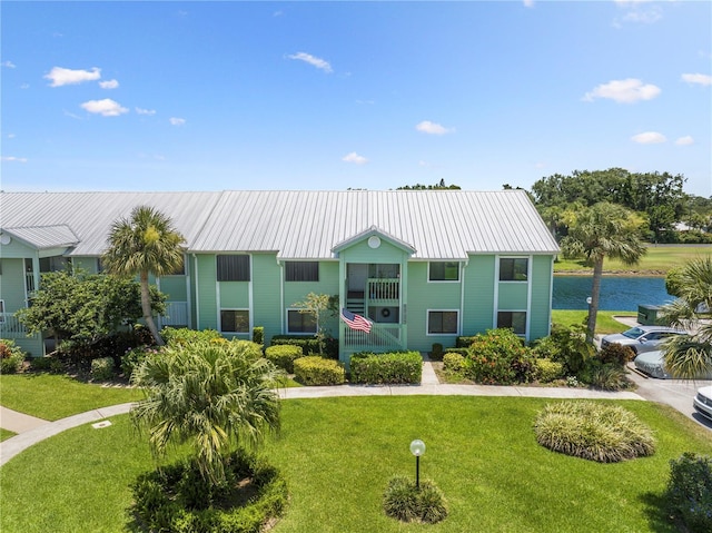 5725 Pelican Pointe Dr Unit 1, Sebastian, FL 32958 - view of building exterior featuring a water view