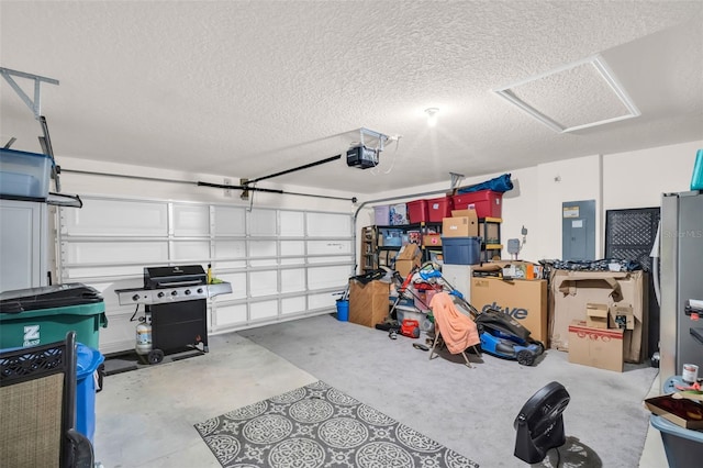 7774 Sail Clover Ln, Zephyrhills, FL 33540 - garage with electric panel and a garage door opener