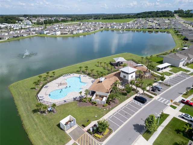 7774 Sail Clover Ln, Zephyrhills, FL 33540 - aerial view of residential area with a pool area and a large body of water