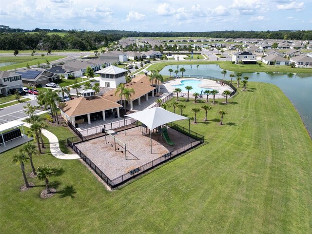 7774 Sail Clover Ln, Zephyrhills, FL 33540 - aerial view of residential area with a nearby body of water