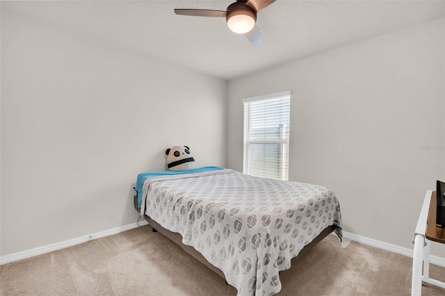 7774 Sail Clover Ln, Zephyrhills, FL 33540 - carpeted bedroom with baseboards and ceiling fan