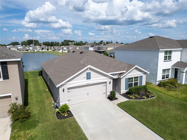7774 Sail Clover Ln, Zephyrhills, FL 33540 - view of front of house with a residential view, a garage, and a front yard