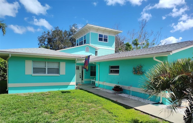 1626 Sea Breeze Dr, Tarpon Springs, FL 34689 - view of front of home featuring a front lawn