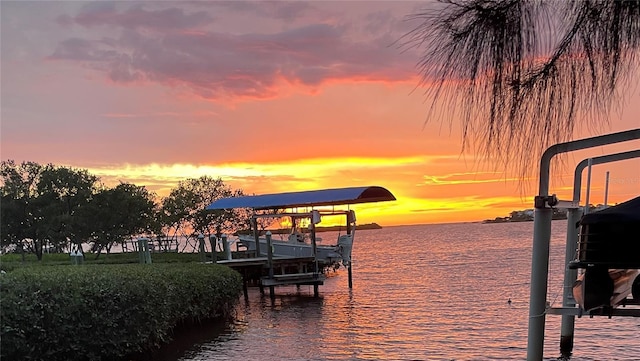 1626 Sea Breeze Dr, Tarpon Springs, FL 34689 - dock featuring boat lift and a water view