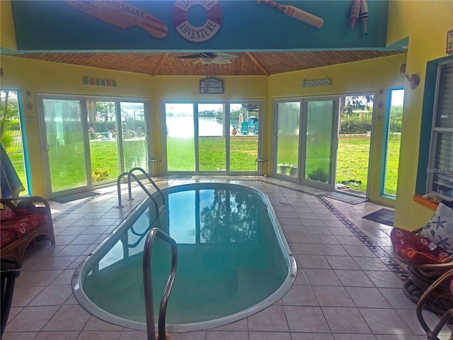 1626 Sea Breeze Dr, Tarpon Springs, FL 34689 - view of swimming pool with a hot tub and ceiling fan