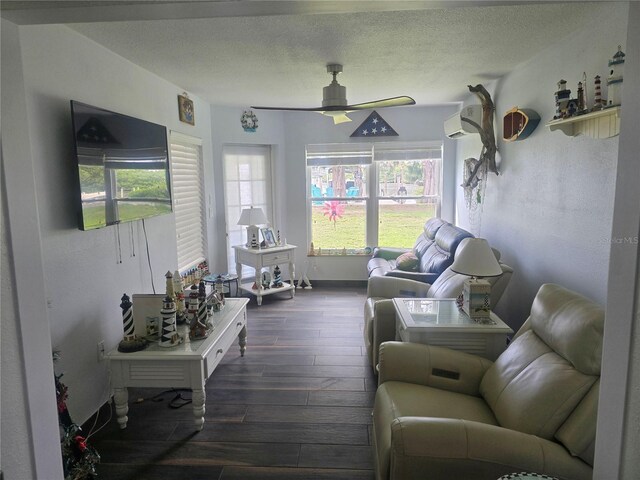 1626 Sea Breeze Dr, Tarpon Springs, FL 34689 - living area featuring healthy amount of natural light, dark wood-style floors, ceiling fan, a textured ceiling, and an AC wall unit