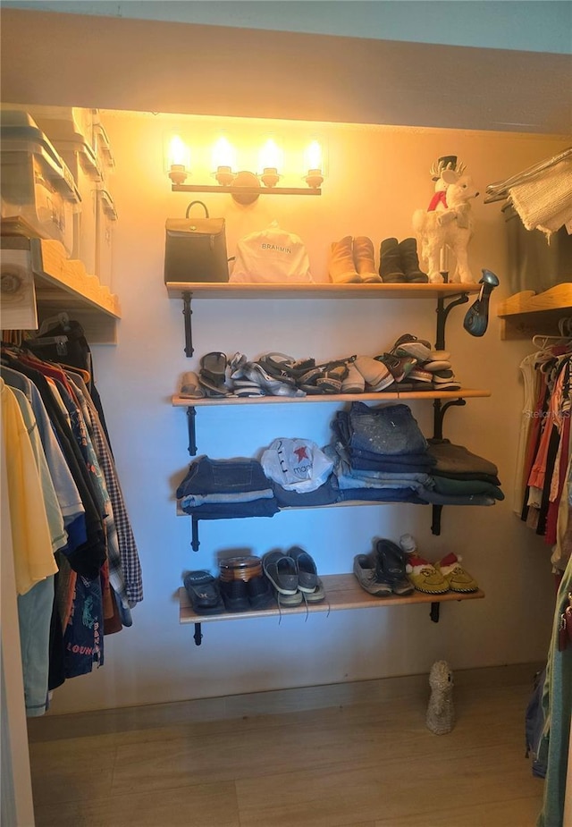 1626 Sea Breeze Dr, Tarpon Springs, FL 34689 - spacious closet featuring wood finished floors
