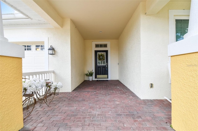 18203 Tivoli Ln, Lutz, FL 33558 - doorway to property featuring stucco siding