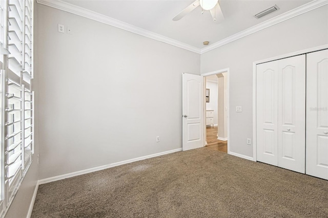18203 Tivoli Ln, Lutz, FL 33558 - unfurnished bedroom featuring crown molding, carpet floors, a closet, and ceiling fan