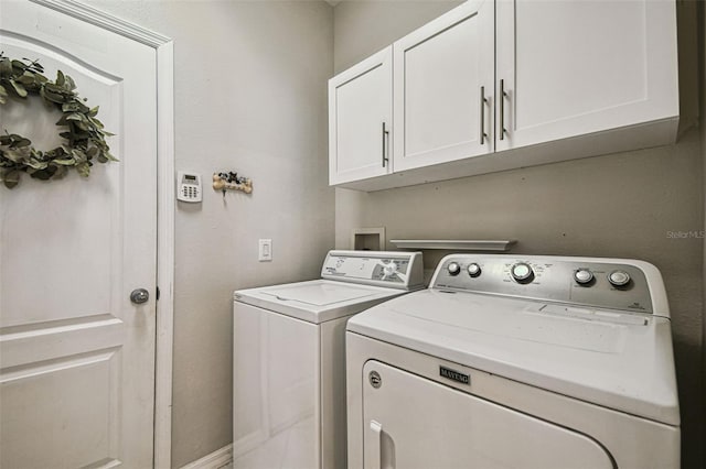 18203 Tivoli Ln, Lutz, FL 33558 - laundry area featuring washer and clothes dryer and cabinet space