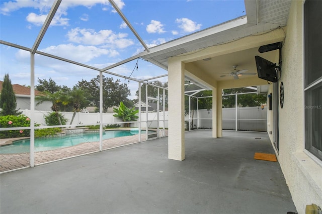 18203 Tivoli Ln, Lutz, FL 33558 - view of pool with a patio area, a fenced backyard, a ceiling fan, and a lanai