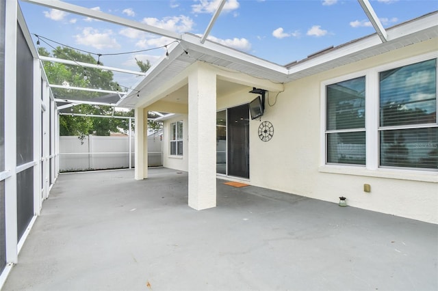 18203 Tivoli Ln, Lutz, FL 33558 - view of patio / terrace with a lanai