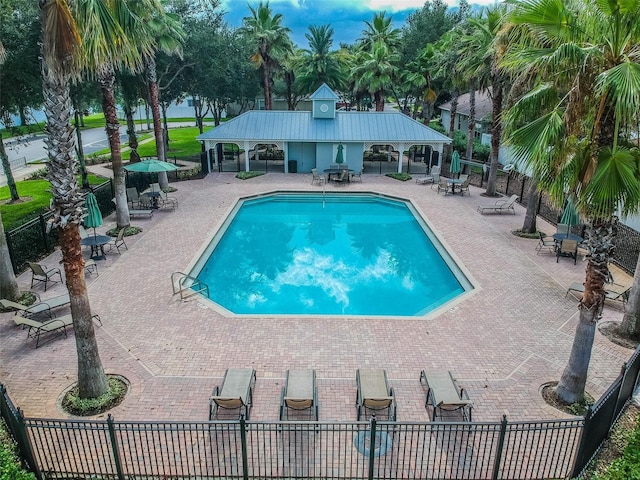 18203 Tivoli Ln, Lutz, FL 33558 - community pool with a patio