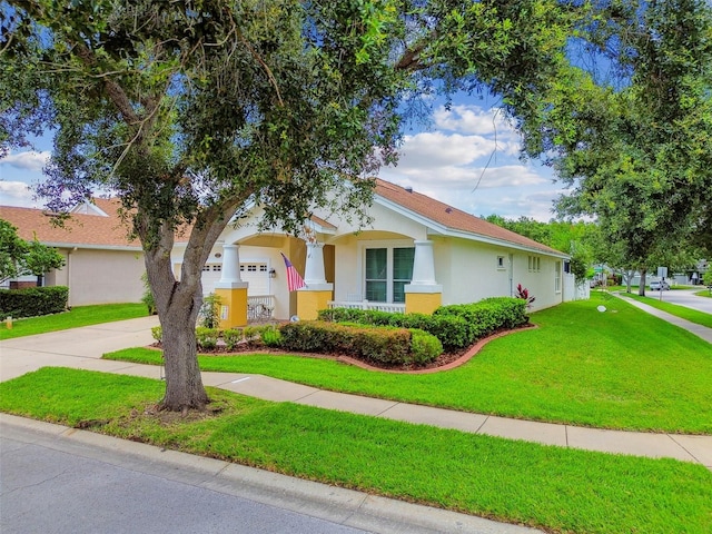 18203 Tivoli Ln, Lutz, FL 33558 - view of front of property with stucco siding, a front yard, and driveway
