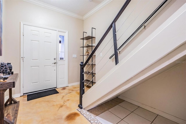 1031 Andrew Aviles Cir, Tampa, FL 33619 - entryway featuring ornamental molding and stairway