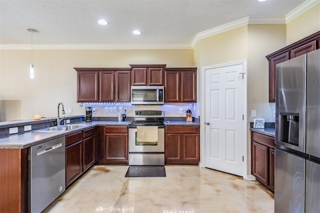 1031 Andrew Aviles Cir, Tampa, FL 33619 - kitchen featuring appliances with stainless steel finishes, a textured ceiling, a peninsula, pendant lighting, and crown molding