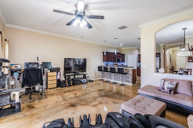 1031 Andrew Aviles Cir, Tampa, FL 33619 - living room featuring concrete flooring, ceiling fan, arched walkways, and ornamental molding