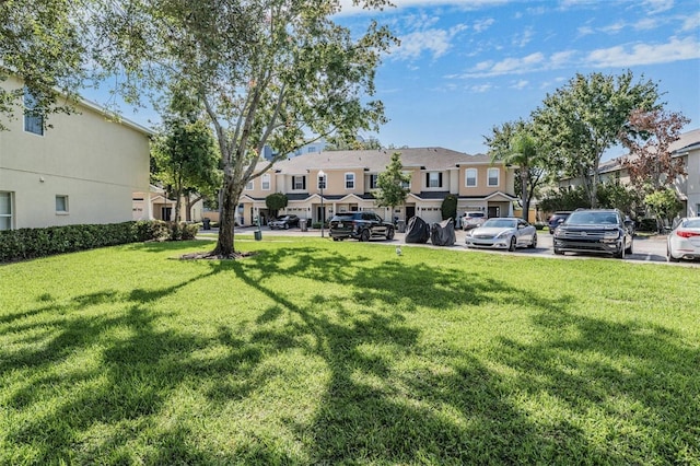 1031 Andrew Aviles Cir, Tampa, FL 33619 - view of green lawn featuring a residential view