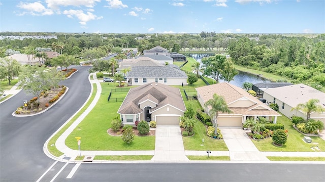 9067 39th Street Cir E, Parrish, FL 34219 - aerial view of residential area featuring a nearby body of water