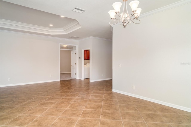 9067 39th Street Cir E, Parrish, FL 34219 - empty room with crown molding, washer / dryer, a chandelier, a tray ceiling, and recessed lighting