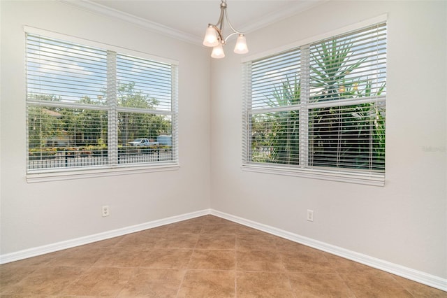 9067 39th Street Cir E, Parrish, FL 34219 - empty room with plenty of natural light, a chandelier, and ornamental molding