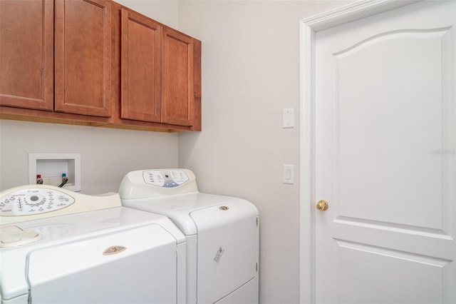 9067 39th Street Cir E, Parrish, FL 34219 - washroom with washing machine and clothes dryer and cabinet space