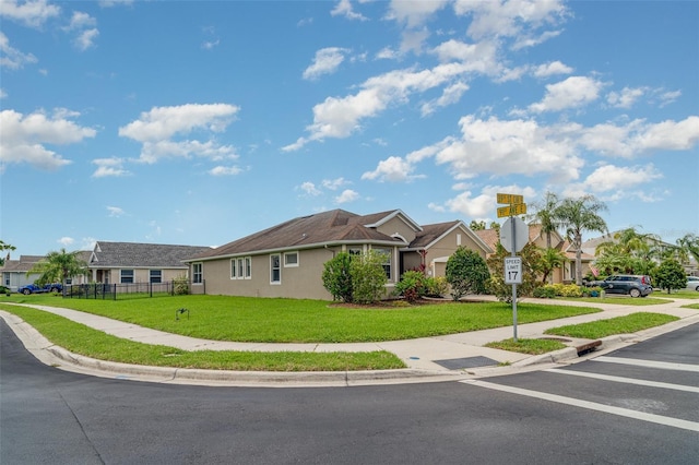 9067 39th Street Cir E, Parrish, FL 34219 - view of front facade featuring stucco siding and a residential view