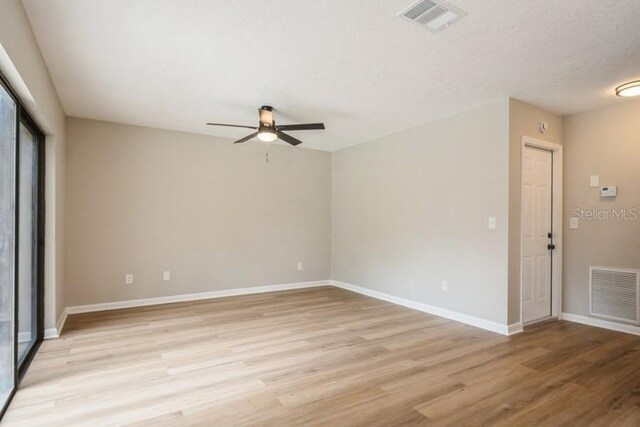 14909 Oldgate Pl, Tampa, FL 33624 - unfurnished room featuring ceiling fan and light wood-style flooring
