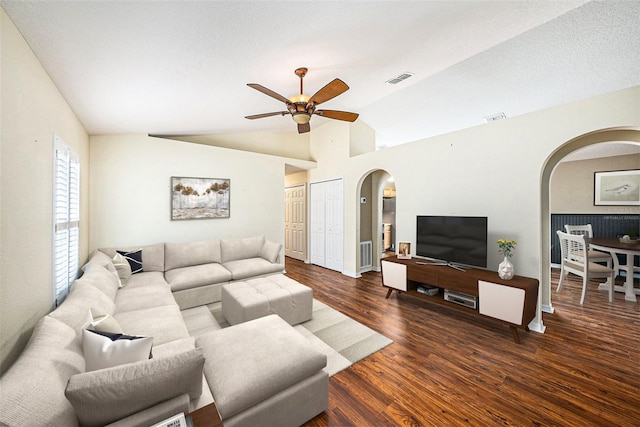 3443 Fyfield Ct, Land O Lakes, FL 34638 - living room with arched walkways, a ceiling fan, wood finished floors, and lofted ceiling