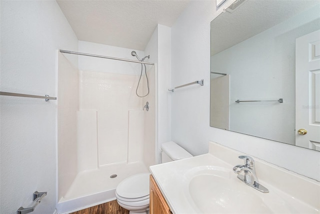 3443 Fyfield Ct, Land O Lakes, FL 34638 - full bathroom with a shower, vanity, and wood finished floors