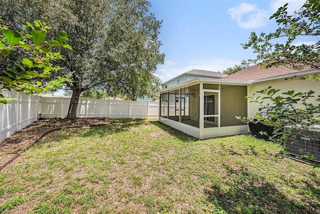 3443 Fyfield Ct, Land O Lakes, FL 34638 - fenced backyard with a sunroom