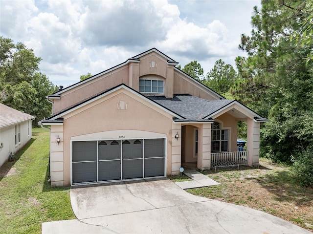 8050 Diablo Ct, Trinity, FL 34655 - view of front facade featuring concrete driveway, a front yard, roof with shingles, and stucco siding