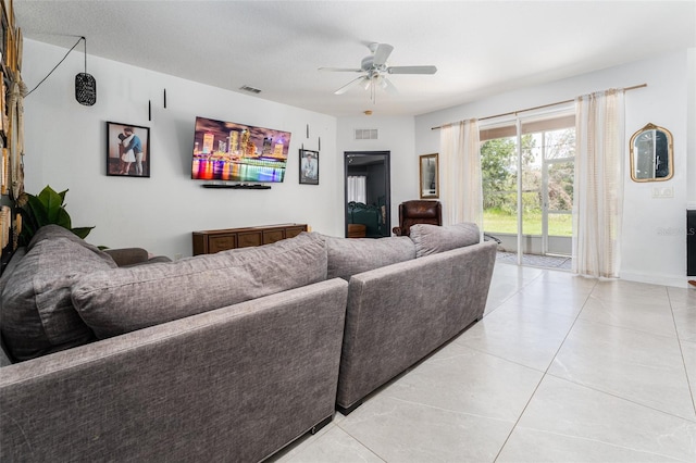 8050 Diablo Ct, Trinity, FL 34655 - living area featuring ceiling fan and light tile patterned floors