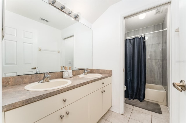 8050 Diablo Ct, Trinity, FL 34655 - full bath featuring tile patterned flooring, double vanity, and shower / bath combo with shower curtain
