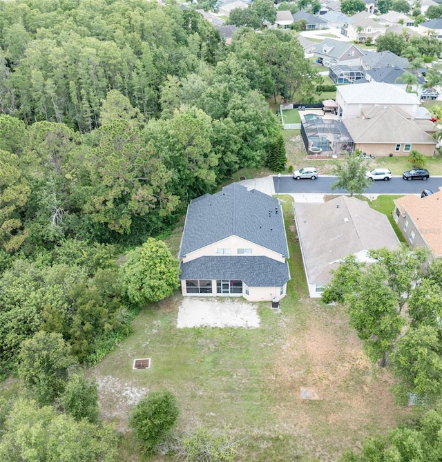 8050 Diablo Ct, Trinity, FL 34655 - aerial perspective of suburban area featuring a heavily wooded area