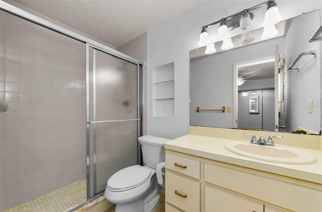 1902 Elaine Dr, Clearwater, FL 33760 - bathroom featuring a shower stall, vanity, and a textured ceiling
